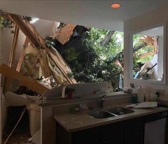 wall in kitchen destroyed from storm damage